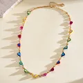 Detailed view of vibrant enamel heart necklace with sparkling rhinestones on gold chain - Multicolor (Long)