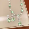 Elegant light green gemstone jewelry set including necklace and teardrop earrings - Necklace and Earring Set / Green