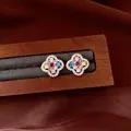 Close-up of multi-colored zircon flower earrings with 14k gold plating on wood - Vintage Flower Style (HE34072) / Gold Multicolor