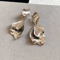 Elegant silver-colored petal-shaped dangling earrings with hammered texture finish - Bright Silver Handcrafted Hammered Petal Style (40#)