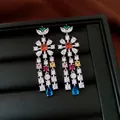 Close-up of vintage style floral tassel earrings with colorful cubic zirconia stones - Floral Waterdrop Tassel / Silver Multicolor