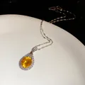 Elegant silver chain necklace featuring a brilliant yellow zircon teardrop pendant detail - Necklace - Silver / Yellow