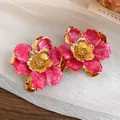 Retro pink enamel flower stud earrings with gold metal centers and steel needle pins - Stud Earrings / Rose Red