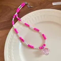 Detailed view of pink beaded necklace with freshwater pearls and mushroom pendant - Mushroom Pendant / Necklace-White-Pink