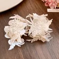 Elegant cream leather flower C-shaped earrings with faux pearl detailing - Leather Flower C-Shaped Stud / Cream White