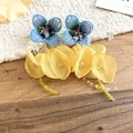 Elegant yellow chiffon flower earrings with blue embroidered details and delicate bead tassels - Silver Earring Post - Yellow