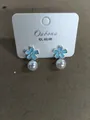 Elegant light blue flower stud earrings with white pearl drops on white display card - Flower Tassel Style (HE31718-1) / Blue