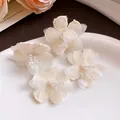 Macro detail of elegant cream fabric flower earrings with delicate bead stamens. - Stud Earrings (Silver Post) / White