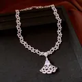 Detail view of luxury zircon necklace with fan-shaped pendant and oval stone center. - Necklace - Silver