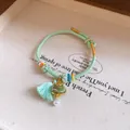 Hand-woven Dragon Boat Festival bracelet with light green rope and cute zongzi charm - Triangle Zongzi (HB5878) / Gold-Green