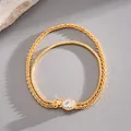 Detailed view of 18k gold plated double-layer bracelet with oval zircon centerpiece - Oval Zirconia Double Layer Chain Style / Gold