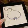 Elegante bracciale regolabile color argento con ciondolo a fiore in zirconi brillanti - Stile 2