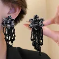 Elegant black and silver beaded flower tassel earrings with vintage aesthetic design. - Style 21 (Silver Pin)
