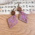 Detail of bohemian wooden earrings with purple floral print and rhombus drop shape. - Rhombus Ear Hook Drop Style / Purple and Coffee