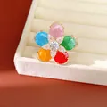 Close-up of 18k gold plated flower ring with colorful gemstones and sparkly zircons - Open Design / Gold-Multicolor