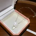 Detail of French style floral resin necklace with a teardrop pendant in a gift box. - Necklace / White