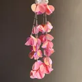 Macro close-up detail of pink iridescent sequin tassel earrings with elegant pearl studs - Phantom Sequin Tassel Style (55) / Pink