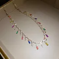 Close-up detail of colorful acrylic square pendants on a sparkling gold rhinestone necklace - Necklace (HN11827) / Gold-Multicolor
