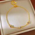 Detailansicht eines eleganten vergoldeten Armbands mit lila Edelsteinen - Lila Oval Stil (HB6074-2) / Gold
