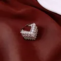 Detailed view of elegant silver-tone chevron ring adorned with sparkling baguette rhinestones - V-Shaped Opening Design / Small / Silver