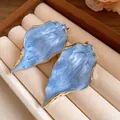 Elegant light blue marbled leaf-shaped stud earrings with premium gold plated edges - Wrinkled Leaf Studs / Blue