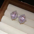 Detailed macro view of vintage palace style pink square zircon earrings in a jewelry box - Stud Earrings (HE34108) / 925 Silver Needle / Pink