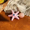 Elegant pink starfish and seashell hair clip with pearls and rhinestones for beach vacation style - Pink