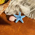 Elegant blue starfish and pink seashell hair clip with pearl for beach vacation - Blue