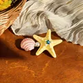 Fresh yellow starfish and pink seashell hair clip with blue rhinestone and pearl accent - Yellow