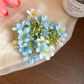 Close-up of small fabric flowers in blue and white for a delicate spring hair clip accessory - Single Hair Clip / Blue