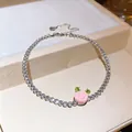 Elegante collana tennis color argento con rosa in resina rosa e foglie verdi - Rosa/Verde
