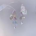 Elegant silver butterfly tassel earrings featuring purple gems and a waterdrop crystal - Butterfly Hollow Style (3#)