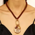 Collar de cuentas estilo océano con dijes de conchas y estrellas de mar en color café - Estilo 06 (3469)