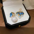 Elegant asymmetric blue enamel floral stud earrings with a dangling white pearl in jewelry box - Asymmetric Pearl Flower (61#)