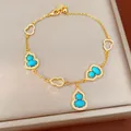 Close-up detail of 18K gold plated calabash bracelet with blue stones and zircons - Gold-Sky Blue (HB6059)