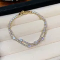 Close-up of 18k gold plated bracelet with sparkling cubic zirconia stones in display box - Wave Chain (5#)