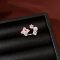 Detailed macro shot of a gold-plated open ring featuring zircon and pearl in a jewelry box - Gold