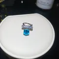 Detailed view of silver ear cuff with blue square cubic zirconia and white stones - Clip-On Earrings / Single Piece / Silver Blue