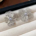 Elegant silver flower stud earrings with pearl centers and cubic zirconia details - Silver Earring Post Style / Silver