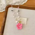 Sweet dopamine style beaded necklace featuring a bright pink resin flower pendant for women - Flower Necklace Style (HN12171) / Pink