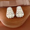 Detailed view of vintage clustered pearl earrings with sparkling zircon accents on a velvet box. - Silver Earring Post Style / Silver