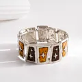 Vintage Silber-Stretcharmband mit bernsteinfarbenem Harz und Sternmuster-Details - Silver Starburst Amber Texture Stretch Bracelet / Silber