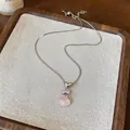 Detailed view of stainless steel heart bow and pink shell pendant necklace for women - Heart Bowknot Shell Style / Silver