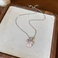 Detailed view of silver stainless steel necklace with pink shell and star pendant - Pearl Star and Shell Style / Silver