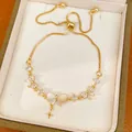 Close-up of 18K gold-plated bracelet with zircon bow and star pendant in a gift box - Gold (Real Gold Plated)
