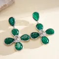 Close-up detail of emerald green resin flower earrings with silver crinkled texture - Drop Earrings (Silver Post) / Green