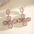 Detailed macro view of pink resin flower earrings featuring wrinkled texture and silver-tone finish. - Drop Earrings (Silver Post) / Pink
