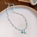 Collier de perles bleu clair avec pendentif étoile de mer et gemme bleue carrée vue - Collier / Argent-Bleu