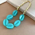 Bohemian chunky teal acrylic marbled bead necklace with irregular polished gold accents - Necklace / Light Green