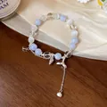 Vue détaillée d'un élégant bracelet en aigue-marine et oeil-de-chat avec breloque - Bracelet Coquillage Queue de Poisson (9#)
